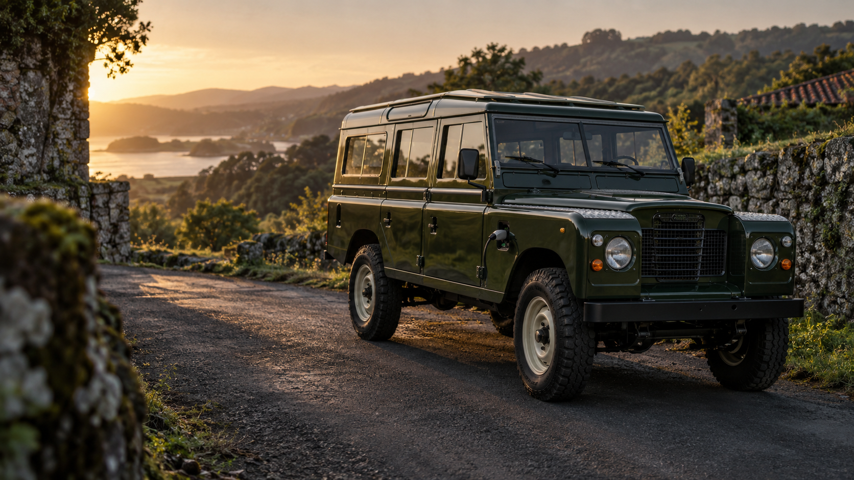 Electric Land Rover Santana concept on a rural road in Galicia at sunset